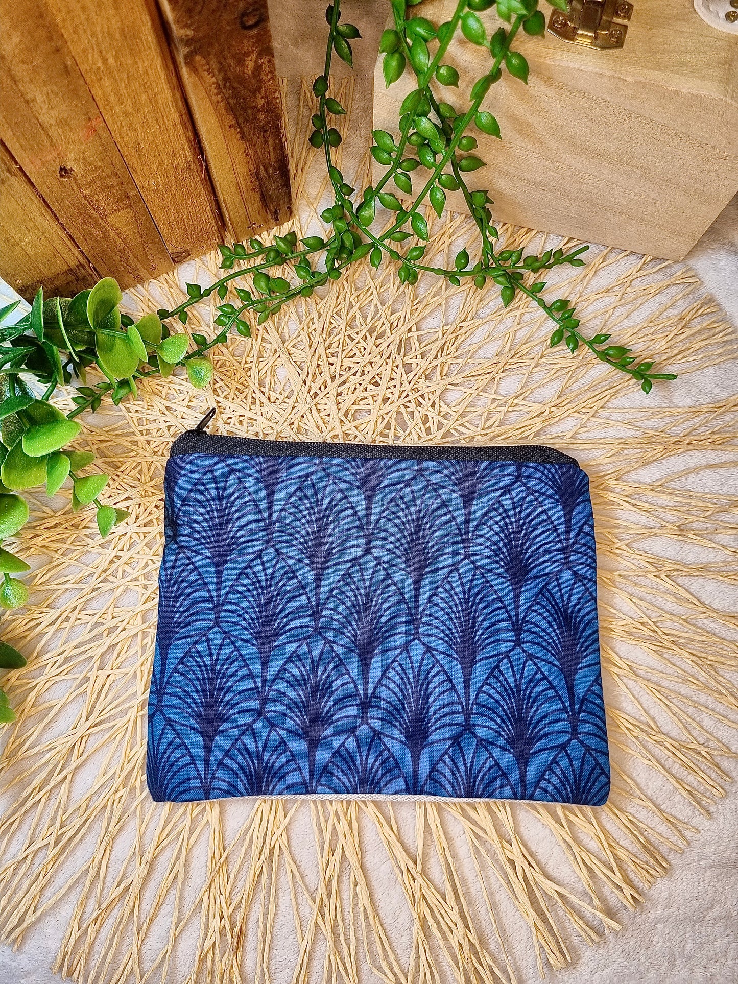 Pochette plume de paon bleue